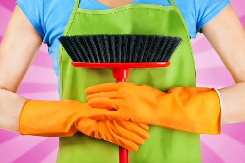 Professional team cleaning a commercial facade in Collierswood
