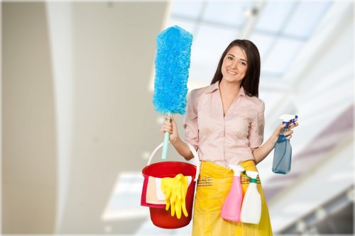 Cleaner treating fabric seating with specialist upholstery equipment